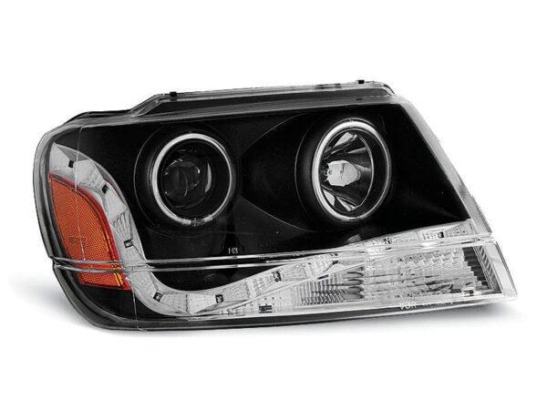 Frontlykter Chrysler Jeep Grand Cherokee 99-05.05 Daylight Black